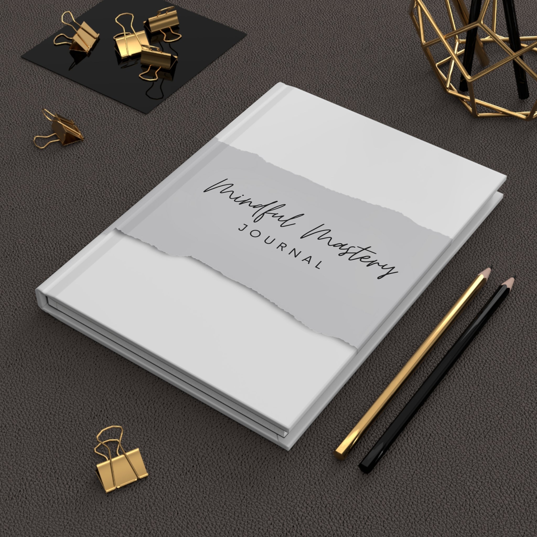 An image of a Mindful Mastery Journal with a pen